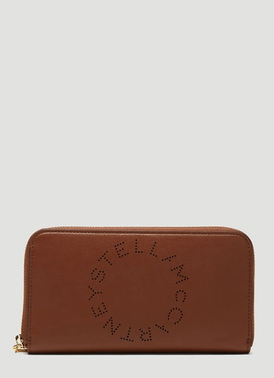 Stella Mccartney Perforated Logo Zip-around Wallet In Brown