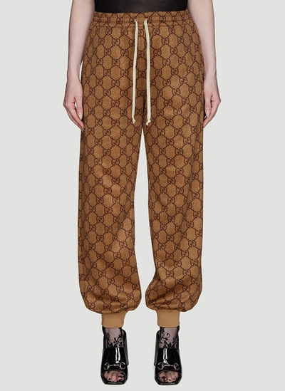 Gucci Gg Print Jogging Track Pants In Brown