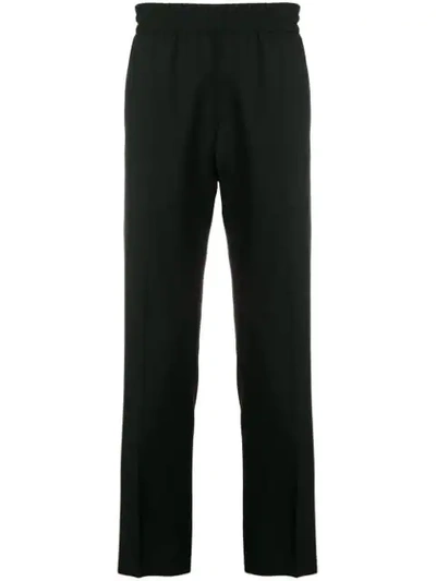 Givenchy Vertical Logo Jogger Pants In Black