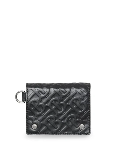 Burberry Monogram Embossed Leather Trifold Wallet In Black