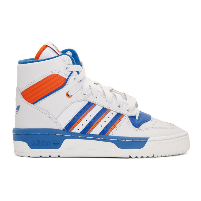 white and blue adidas originals