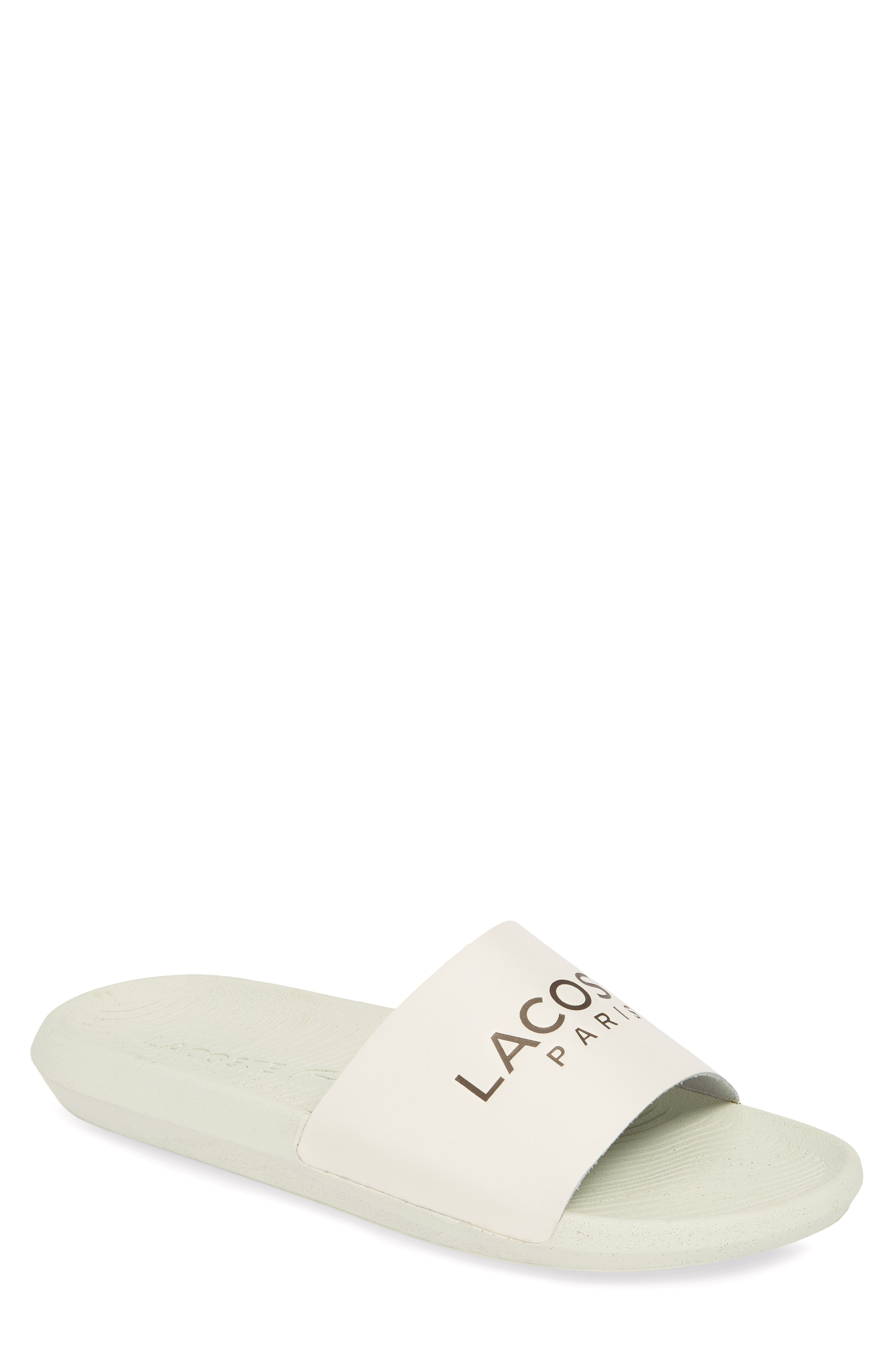 white and gold lacoste slides