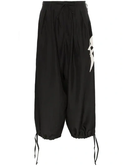 Yohji Yamamoto Graphic-side Cropped Wide-leg Silk Trousers In Black