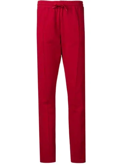 Alexandre Vauthier Embellished Brooch Track Trousers In Red