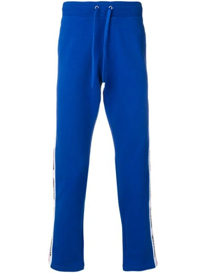 Moschino Logo Stripe Track Pants In Blue