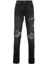 Amiri Slim Distressed Jeans In Black