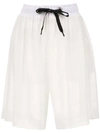 À La Garçonne Chiffon Bermuda Shorts In White