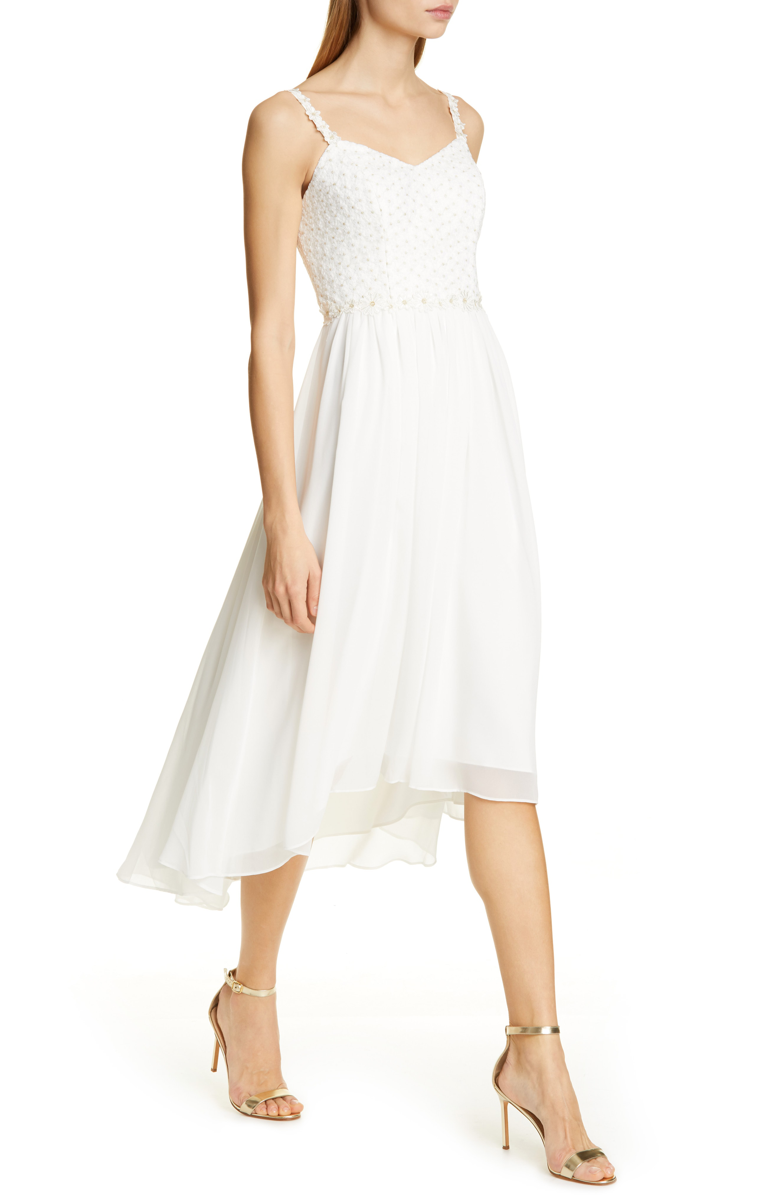white dip hem dress
