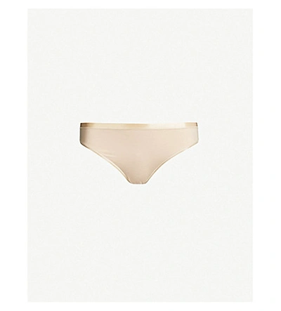 Hanro Seamless Stretch-cotton Thong In 0274 Beige