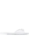 Ferragamo Cirella Flat Pvc Jelly Bow Slide Sandals, White In New Bianco