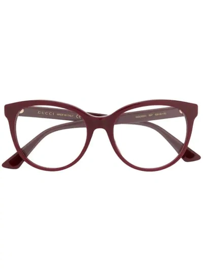 Gucci Oval Frame Glasses In Red