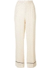 Ganni Dotted Print Trousers In Neutrals