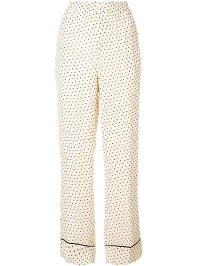 Ganni Dotted Print Trousers In Neutrals