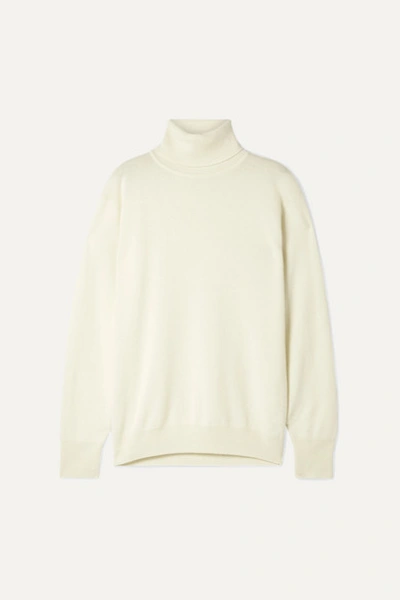 The Row Janillen Oversized Cashmere Turtleneck Sweater In Ivory