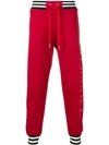 Acne Studios Slogan Print Sweatpants In Red