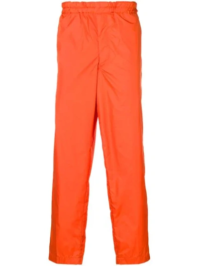 Comme Des Garçons Shirt Side Panel Track Pants In Orange