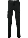 Stone Island Pocket Detailed Trousers In Black