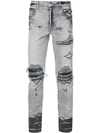 Amiri Slim Distressed Jeans - White