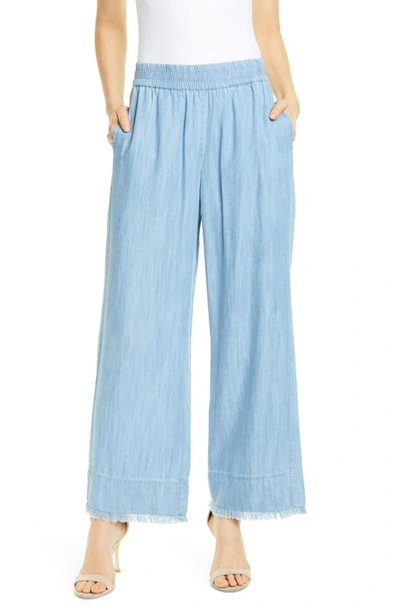 Alice And Olivia Benny Smocked-waist Frayed Ankle Pants In Medium Chambray