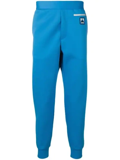 Prada Logo Patch Track Trousers In Light Blue