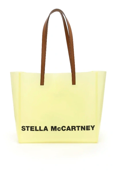 Stella Mccartney Small Tpu Logo Shopper In Yellow,brown