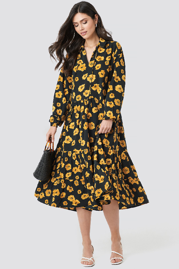 black dress with orange flowers