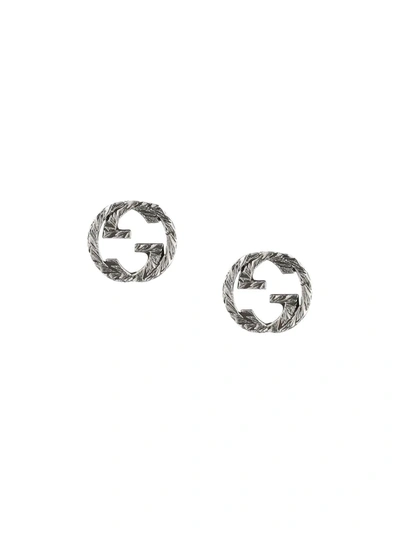Gucci Stud Earrings With Interlocking G Motif In Aged Sterling Silver