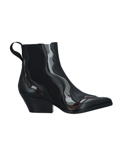 Sergio Rossi Pvc-trimmed Leather Ankle Boots In Black