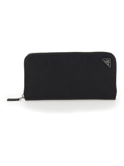 Prada Embossed Logo Zip Around Wallet In Black