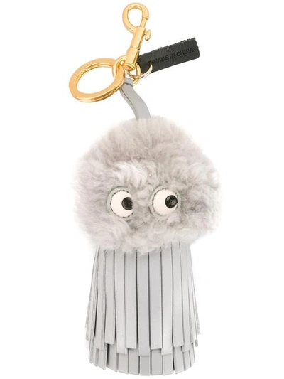 Anya Hindmarch Eyes Shearling Tassel Charm In Grey | ModeSens