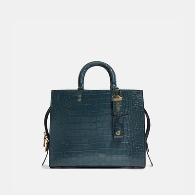 Coach Rogue In Alligator In Brass/blue