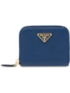 Prada Logo Zipped Wallet In Blue