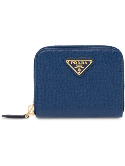 Prada Logo Zipped Wallet In Blue