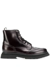 Prada Men's Wing-tip Leather Combat Boots In Black