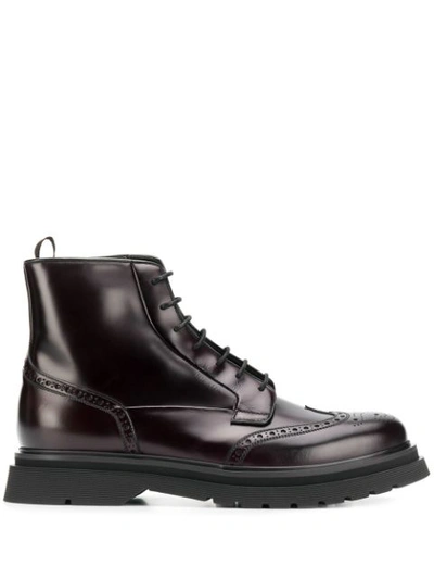 Prada Men's Wing-tip Leather Combat Boots In Black
