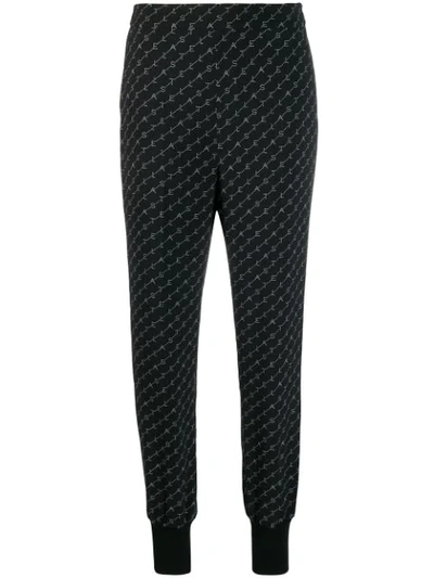 Stella Mccartney Julia Loose-fit Tapered Stretch-crepe Trousers In Black