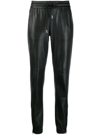 Saint Laurent Tapered Leather Trousers In Black