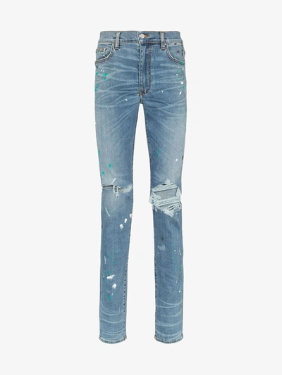 Amiri Paint Splatter Distressed Jeans Indigo In Blue