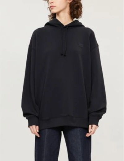 Acne Studios Hooded Oversized Face Patch Sweatshirt In Black