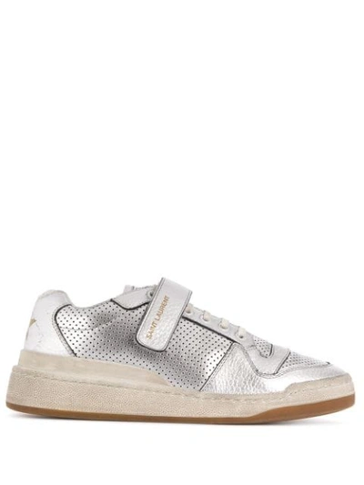 Saint Laurent Travis Logo-print Distressed Perforated Metallic Leather Sneakers In Silver