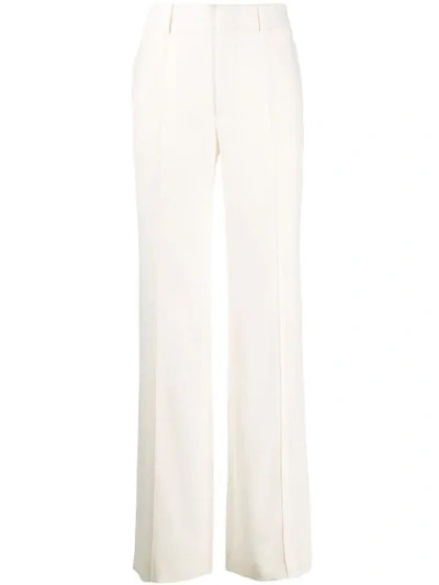 Chloé Pleated Front Flared Trousers In White