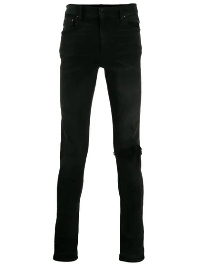 Amiri Broken Skinny Jeans In Black