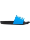 Prada Logo-embossed Rubber Slides In Blue