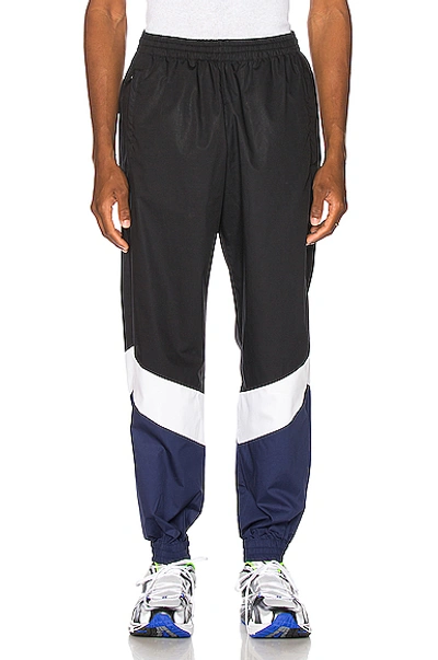 Vetements Mustermann Panelled Cotton-shell Track Pants In Black,blue
