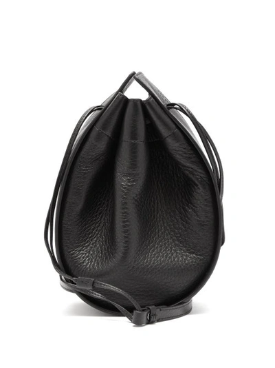 The Row Drawstring Grained-leather Cross-body Bag In Black