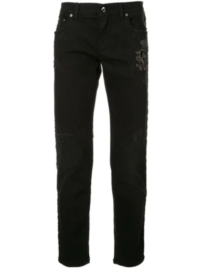 Dolce & Gabbana Distressed Logo Patch Jeans In Black