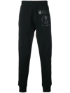 Moschino Printed Logo Track Pants In Black