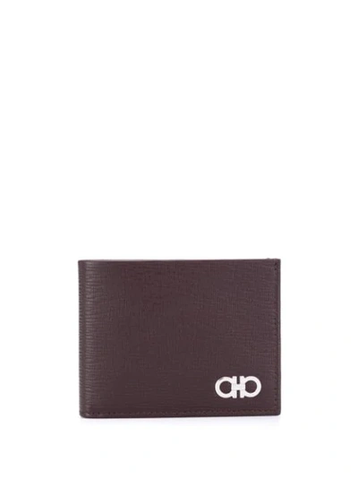 Ferragamo Gancini Bifold Wallet In Brown