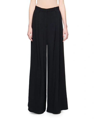 The Row Ossie Pleated-front Wide-leg Pants In Black