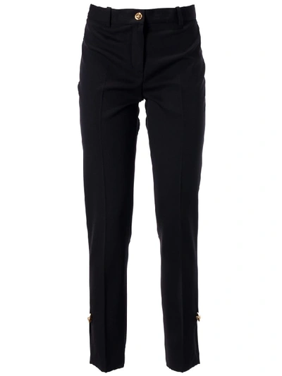 Versace Button Embellished Trousers In Black